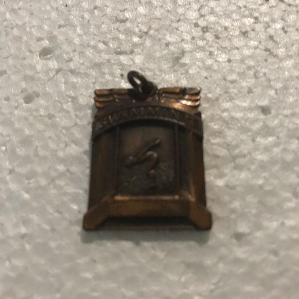 Antique- copper 1959 swimming pendent